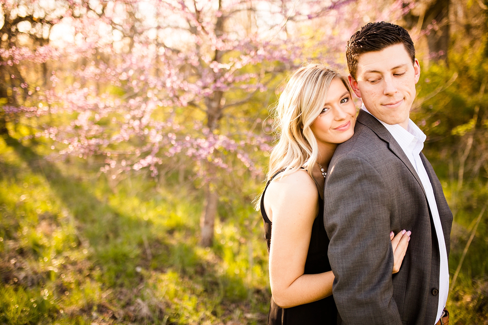 Dressy Couple taking Spring Engagement Photos in St. Louis 